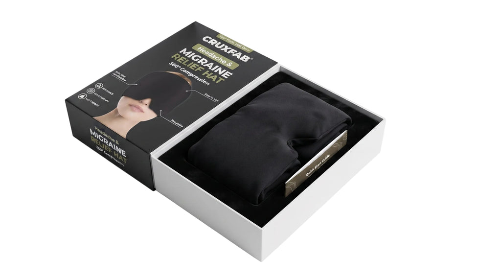 Black Thermax head comfort cap folded beside its packaging